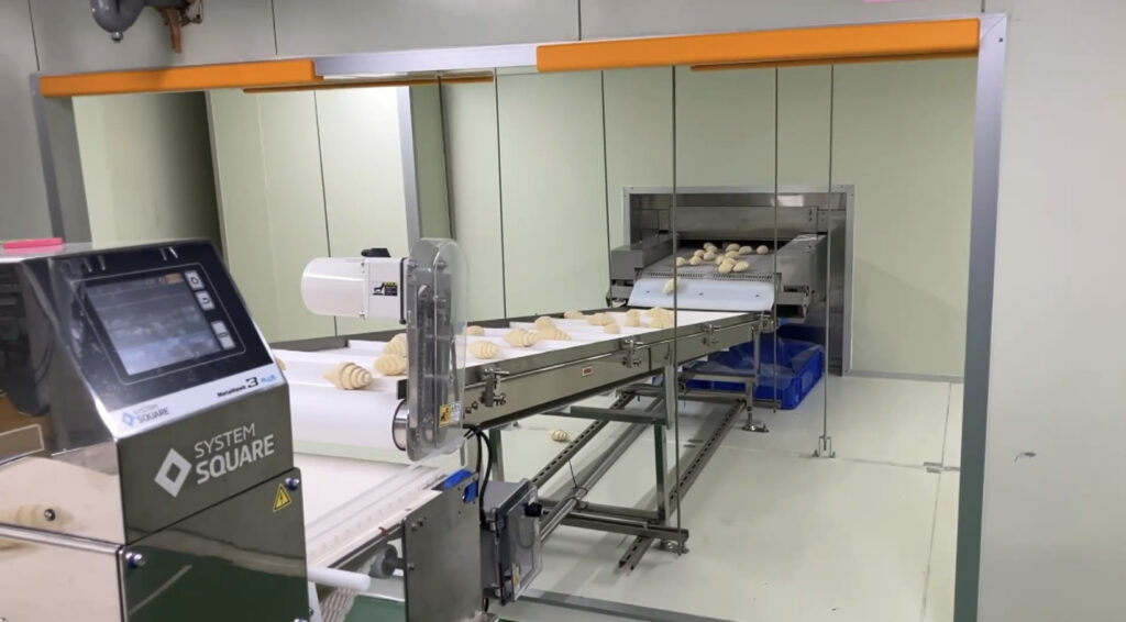 スパイラルフリーザー出口の搬送